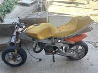 Mota de pista crianca