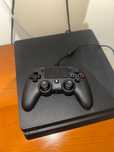 PlayStation 4 + dois comandos + 5 jogos
