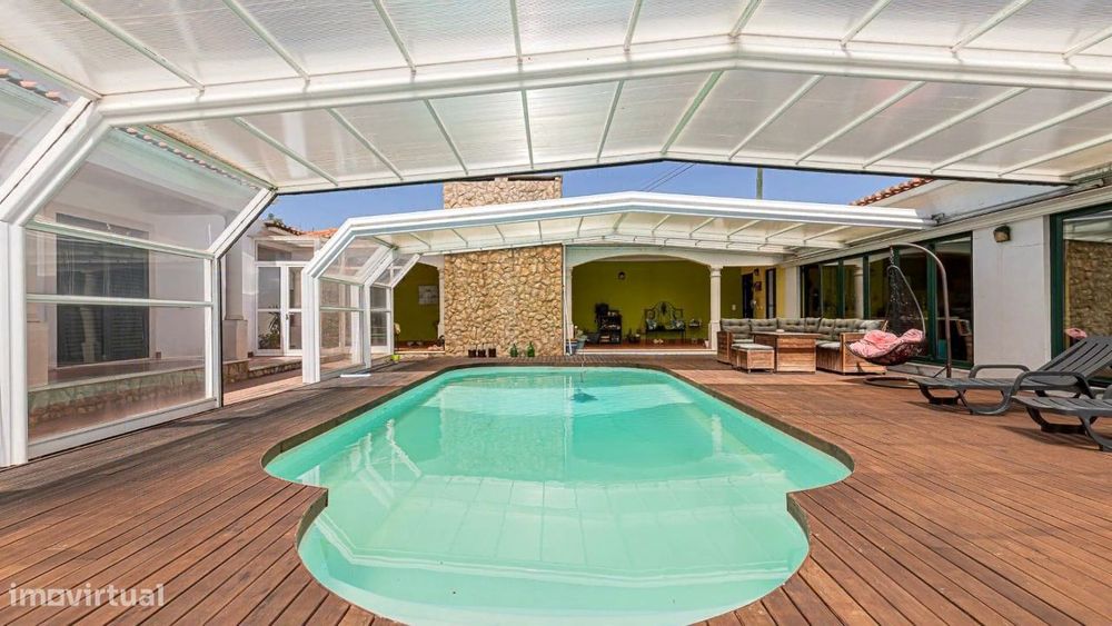 Moradia T4 inserida num lote de terreno com 5000m2