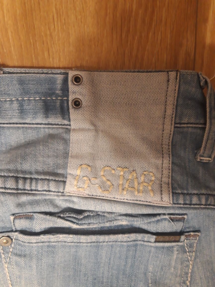 Spodnie jeansy przetarte r. 40