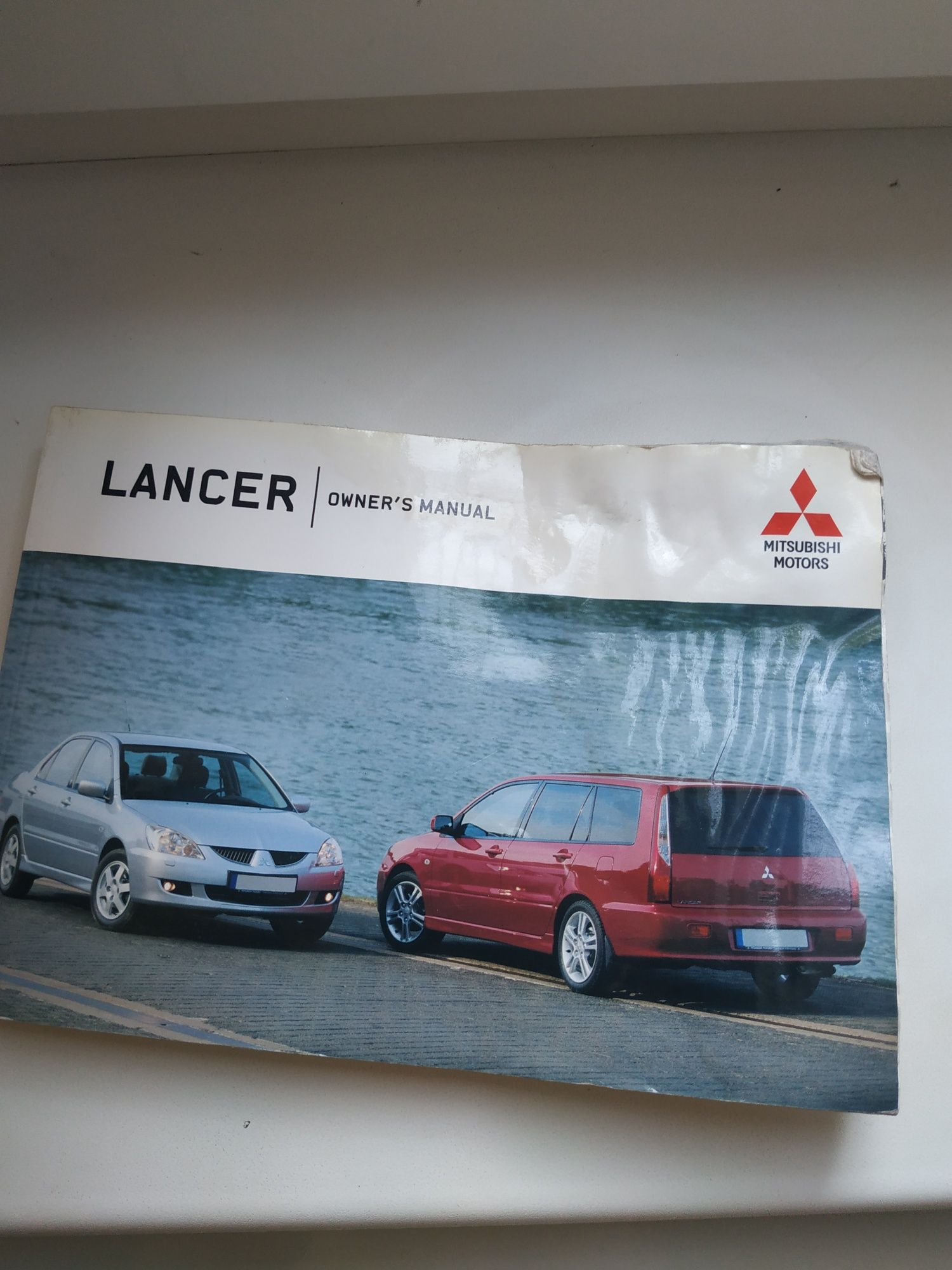 Книжка авто Lancer 150грн. оригинал