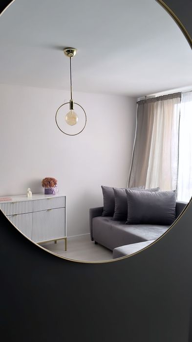 Nowoczesna szara sofa - idealna do minimalistycznych wnętrz