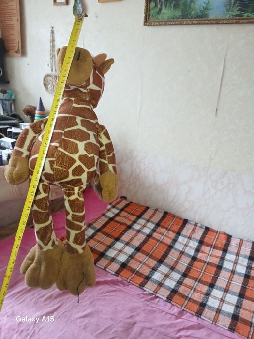 Продам жирафа игрушку