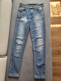 Spodnie jeans damskie