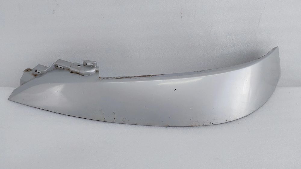 Friso ótica esquerda NISSAN NV200 Furgão/Combi (M20)