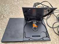 PlayStation 2 com cabos e comando
