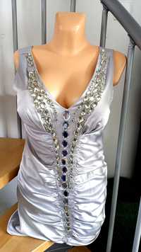 Sukienka mini srebrna kokarda kryształki translarentne dekolt w serek