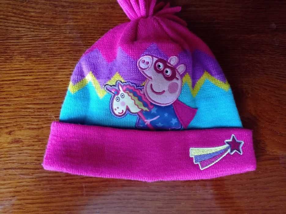Продам дитячу шапку на дівчинку .