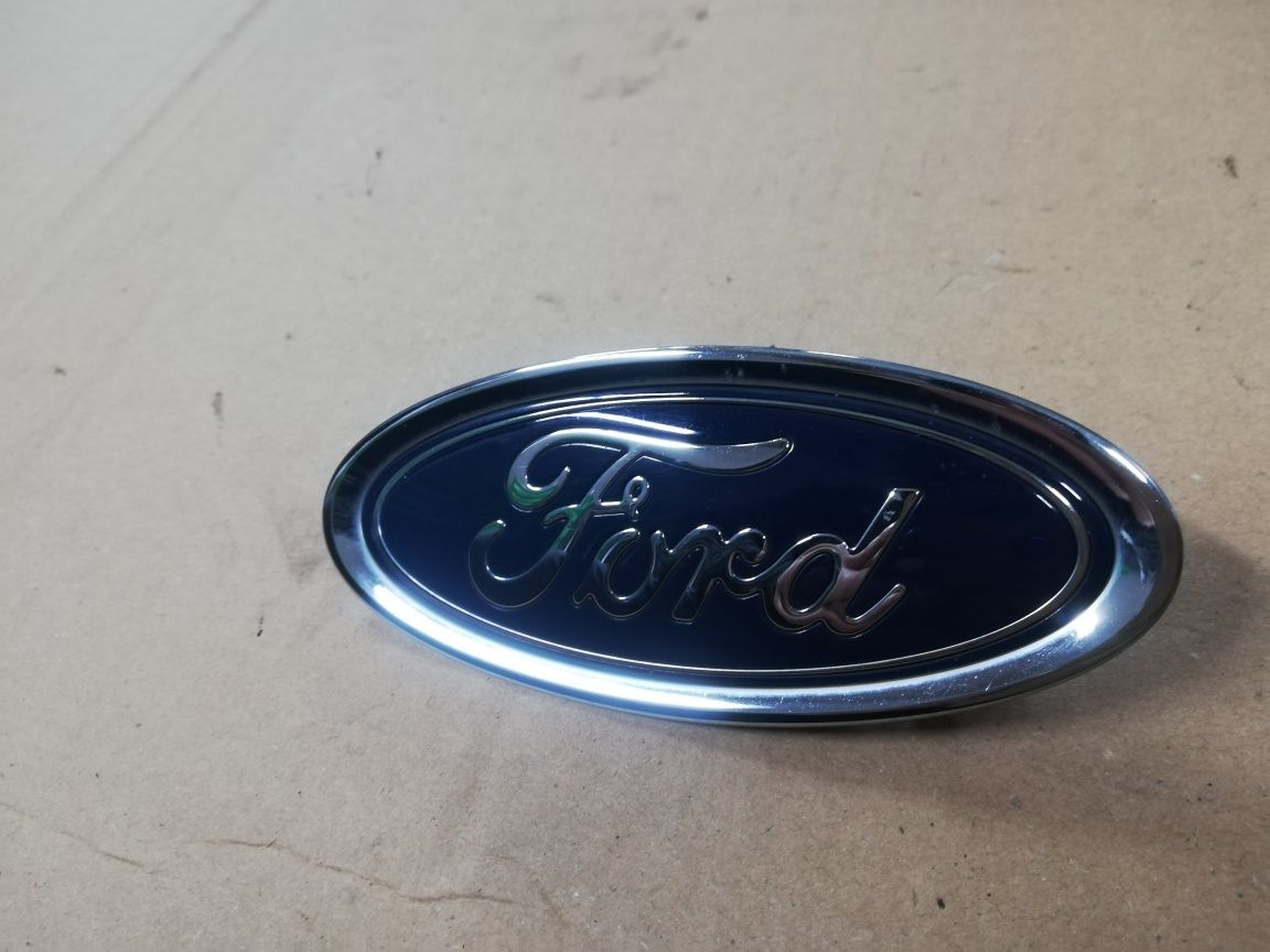Emblemat znaczek logo zderzaka przedniego przód Ford Focus mk4 IV oryg
