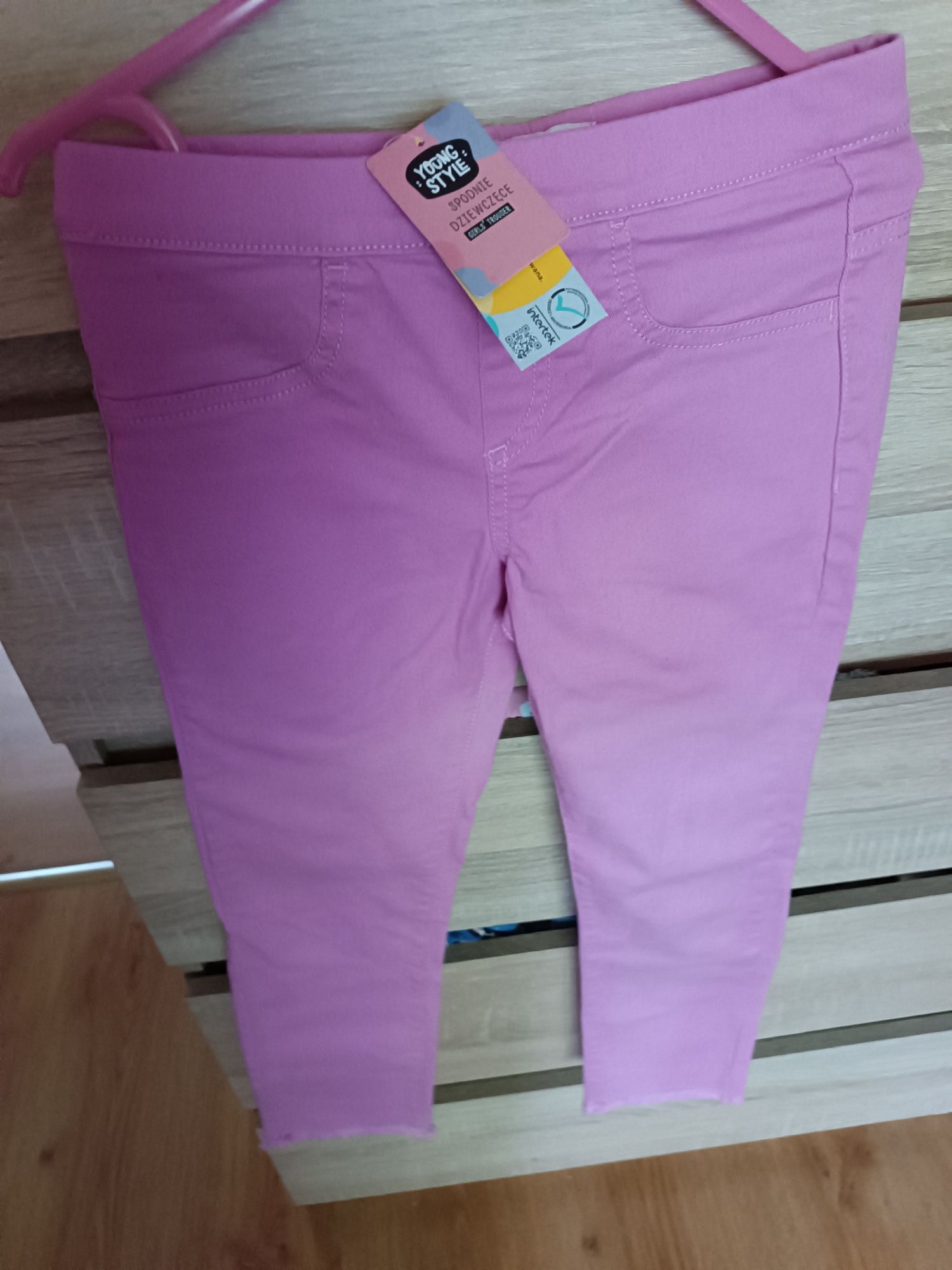 Nowe spodnie dla dziewczynki Young style rozmiar 122-128