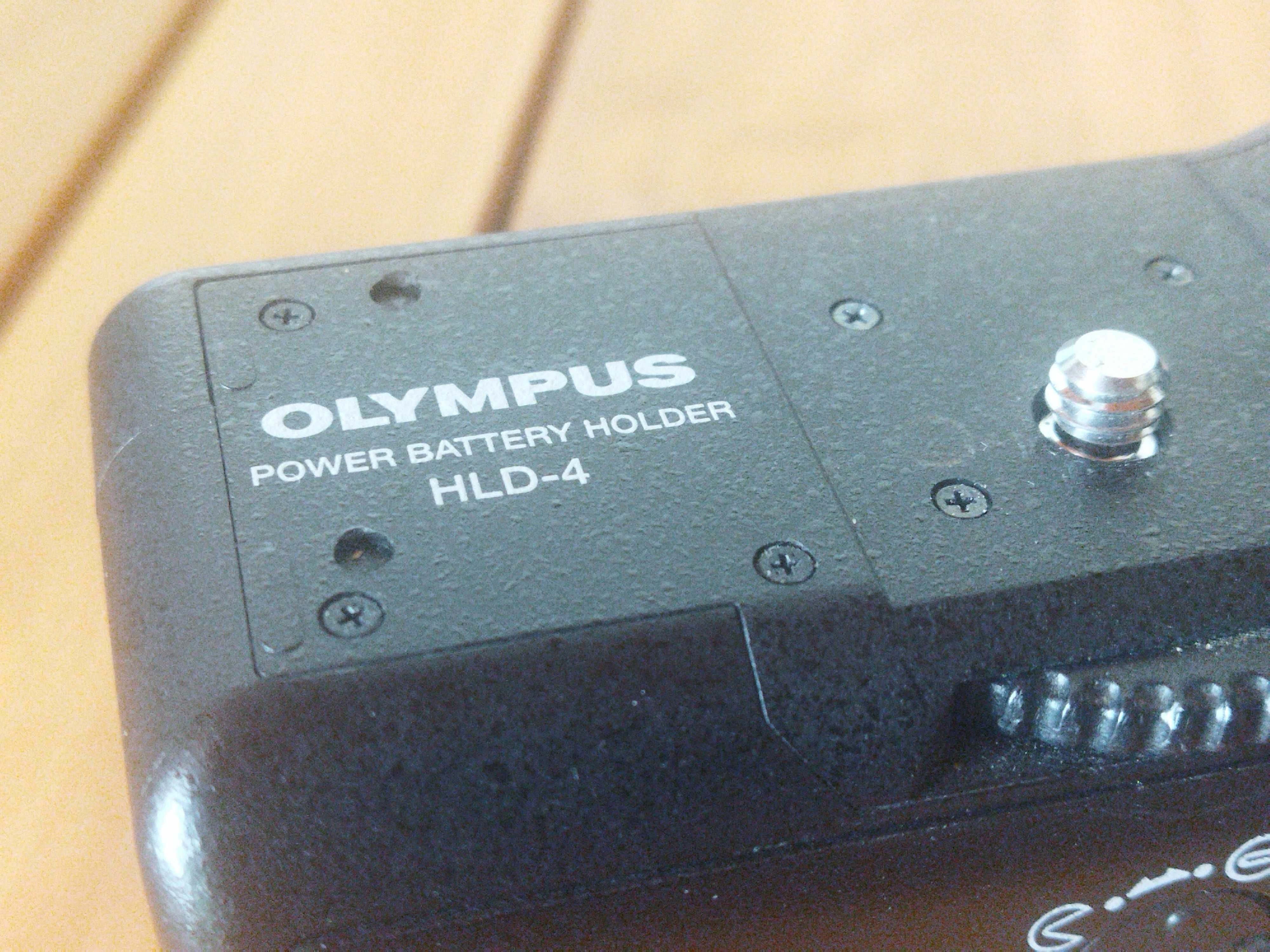 Punho (grip) Olympus HLD-4