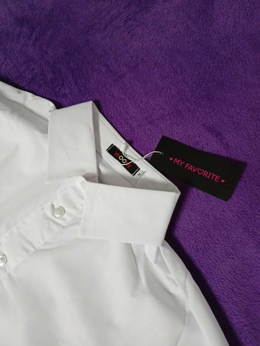 Біла жіноча сорочка