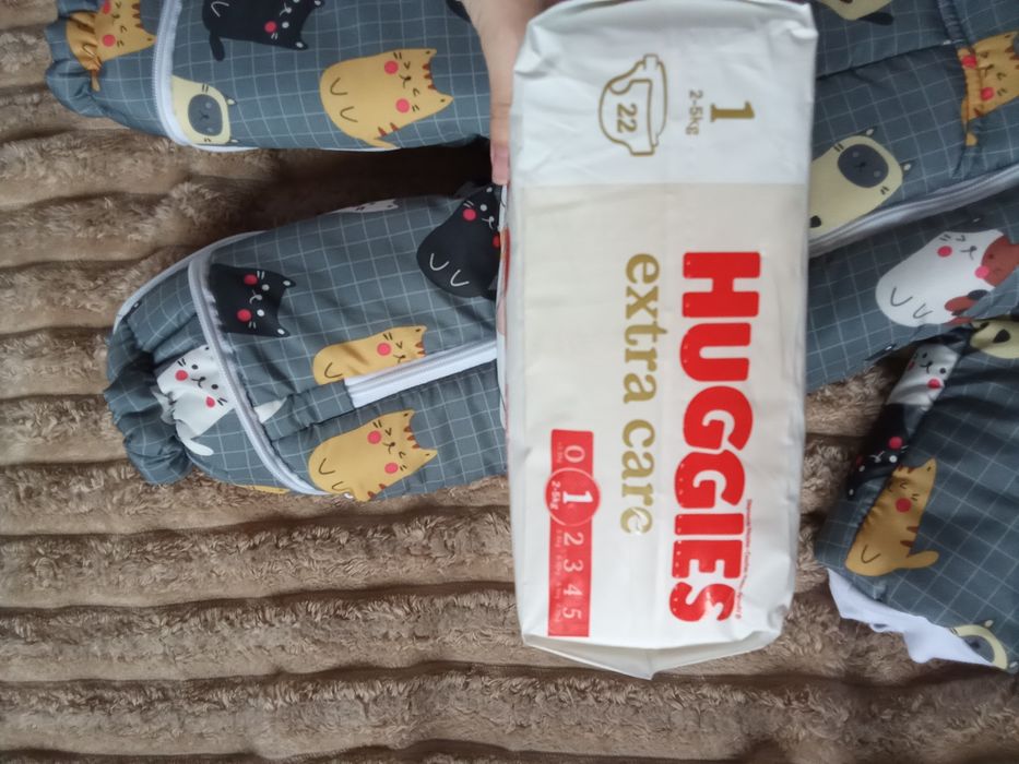 Продам памперси 1 і комбінезон трансформер