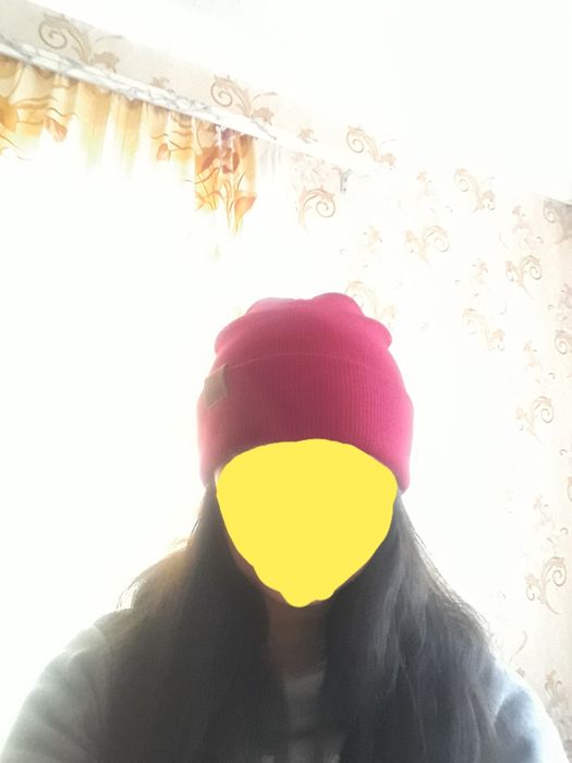 Жіноча тепла шапка.