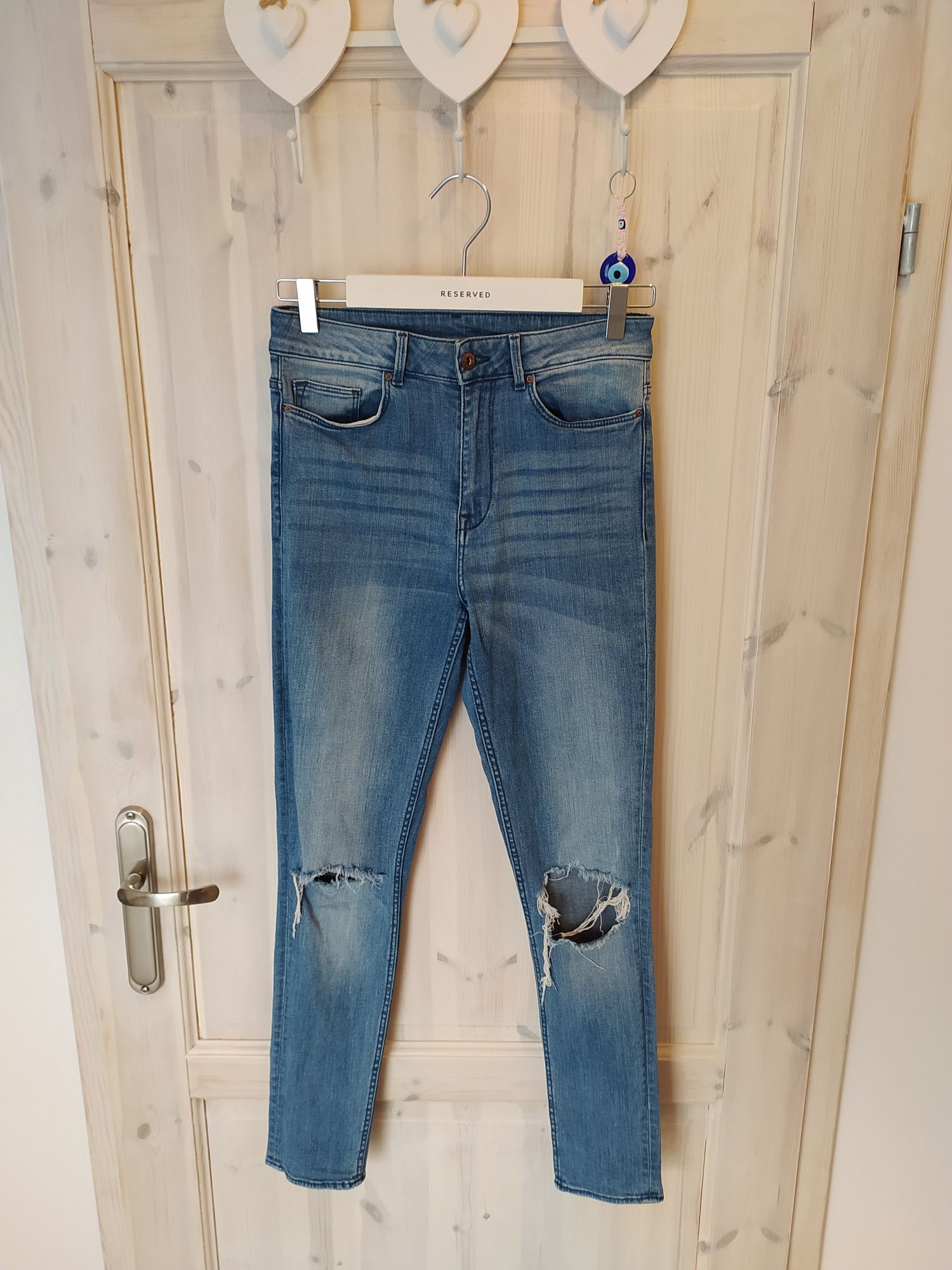Jeansowe dżinsowe spodnie jeansy dżinsy z dziurami H&M 36 S