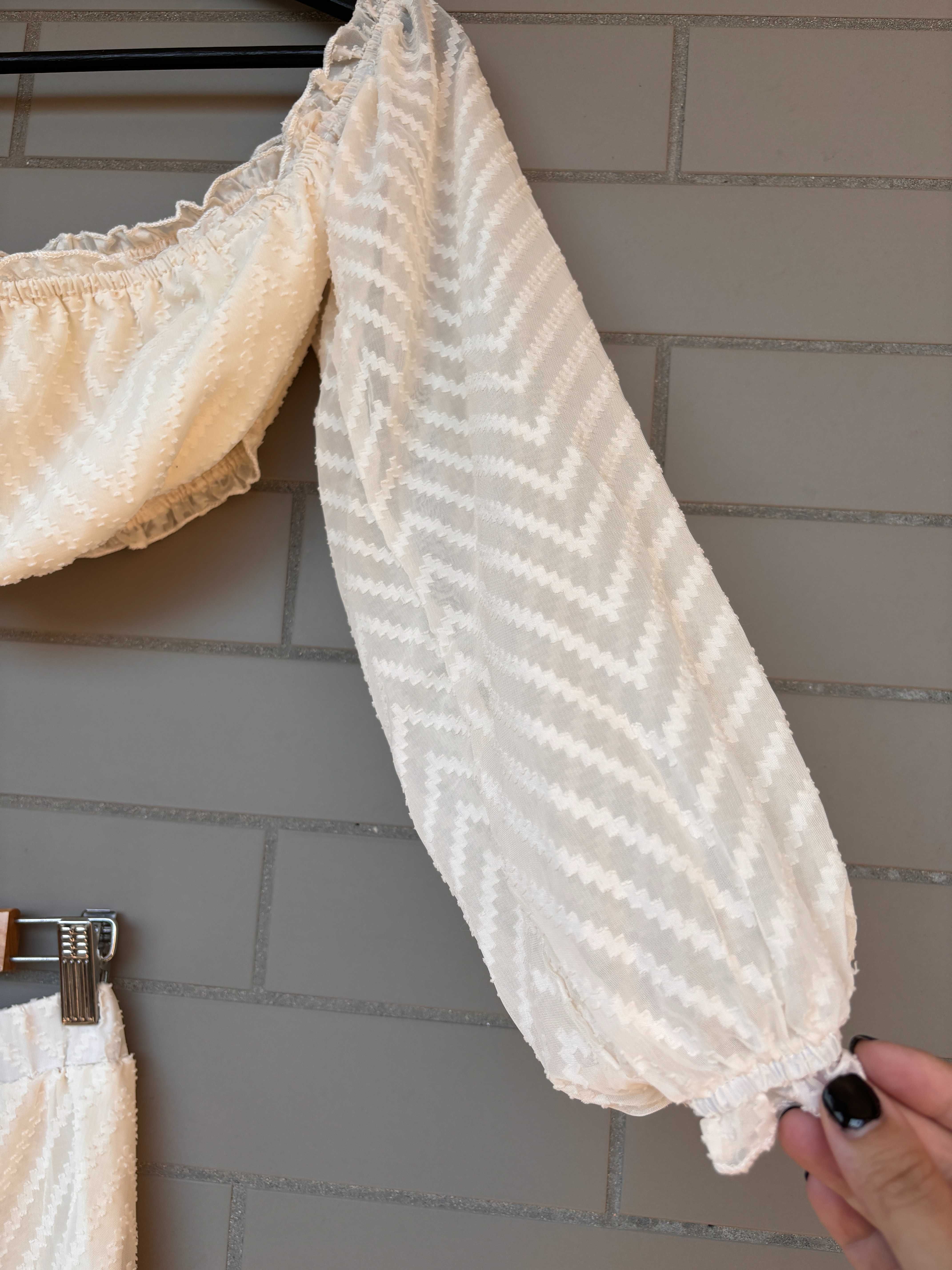 Conjunto top e saia-calção novo