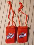 2 bolsas de criança de pendurar ao pescoço da Yoggi - NOVAS