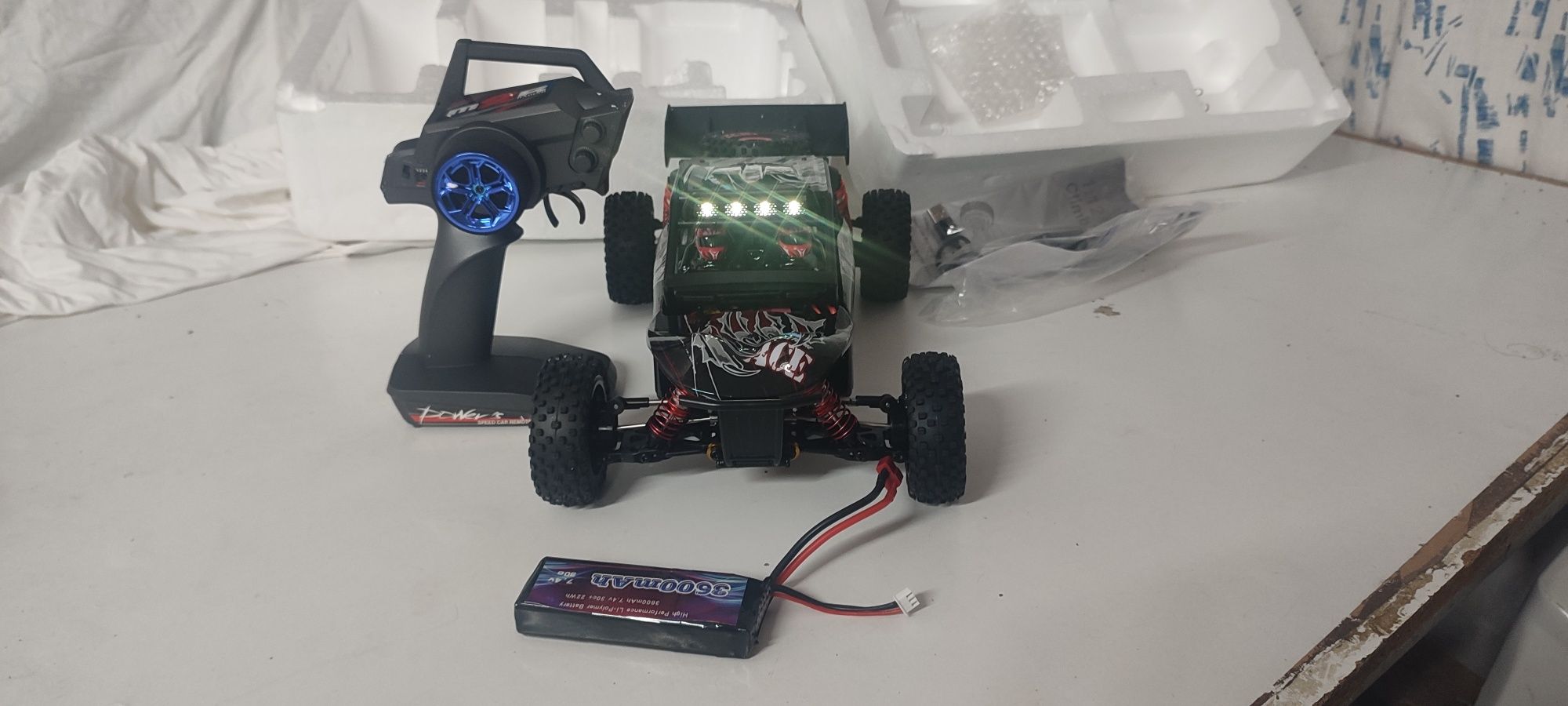 Wltoys 124016, 2 baterias lipo, brushless 75km