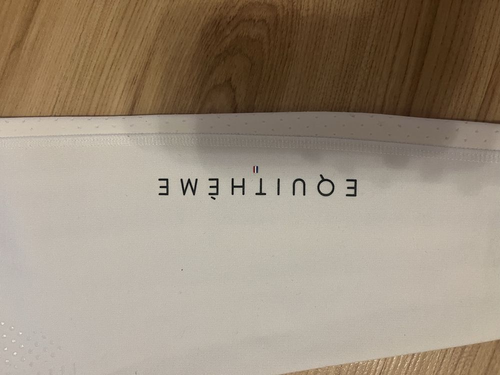 Białe leginsy jeździeckie Equithème