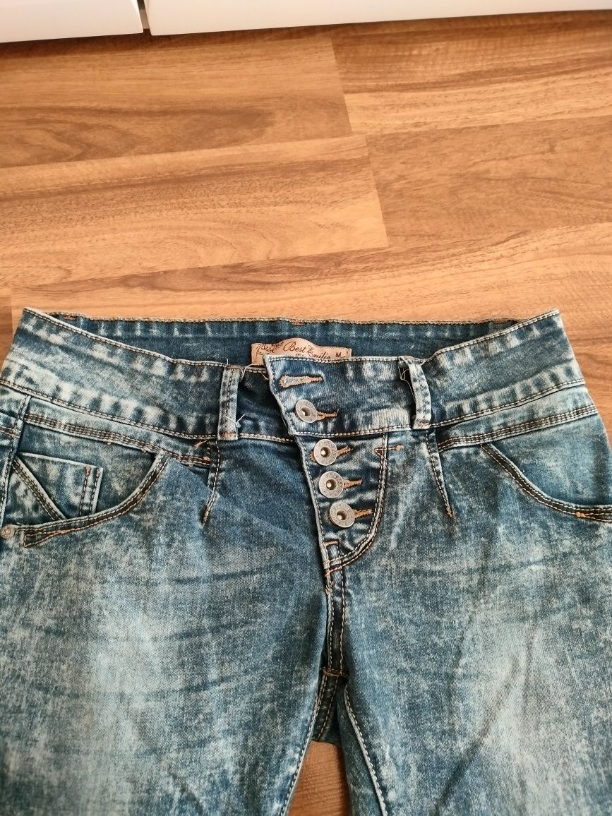 Spodnie damskie jeansy rozmiar 38