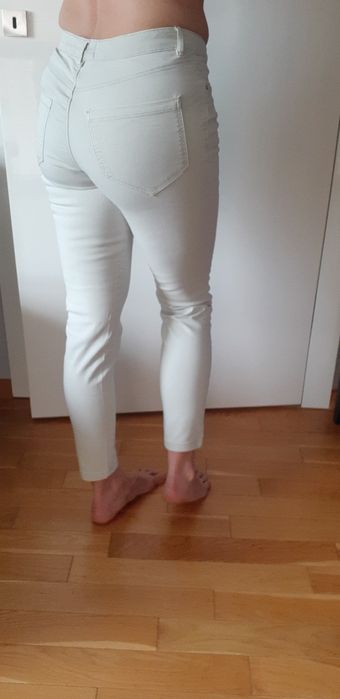 Spodnie dżinsy rurki seledynowe