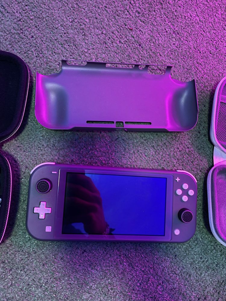 Vendo nintendo switch lite com acessorios/ troco