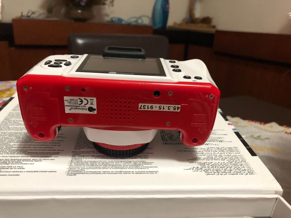 Máquina fotográfica de criança