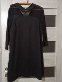 Czarna sukienka z tiulowymi rękawami