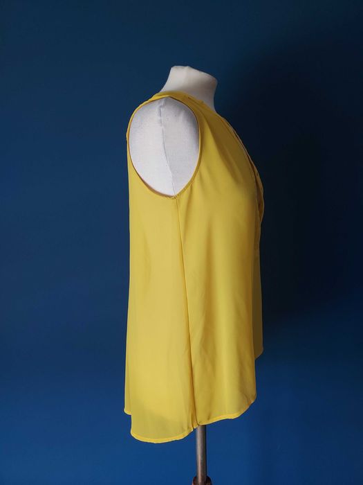 Top túnica amarelo com botões em madrepérola