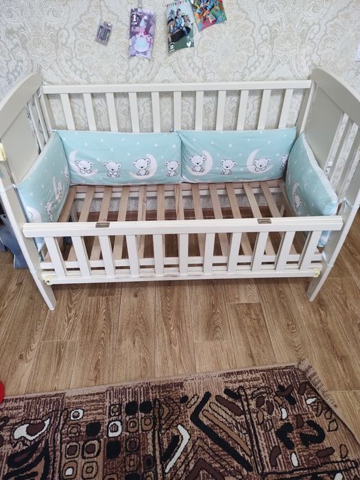 Ліжко дитяче з маятником бортиками та балдахфном