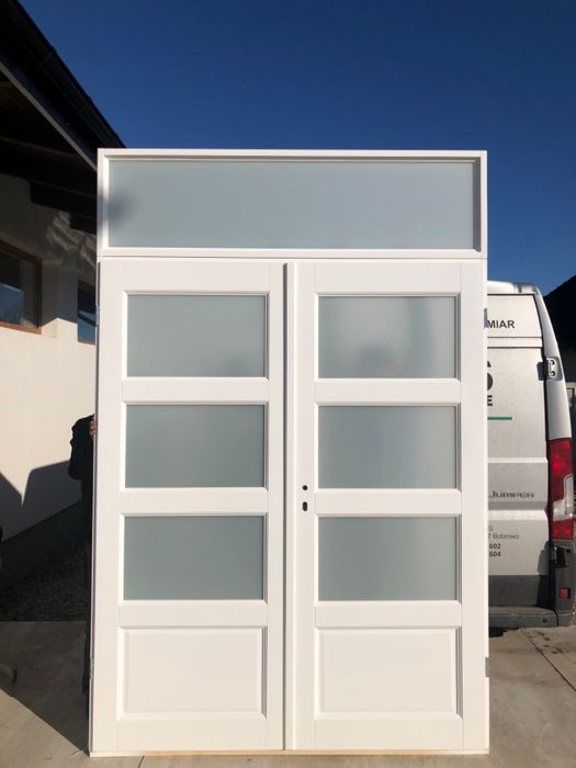 Drzwi wewnętrzne  drewniane dwuskrzydłowe z naświetlem Cała Polska