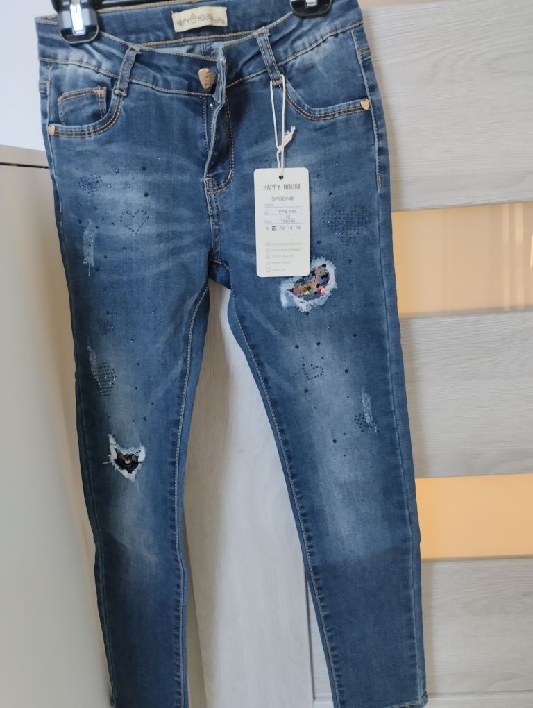 Nowe Spodnie jeansowe rozm 134/140