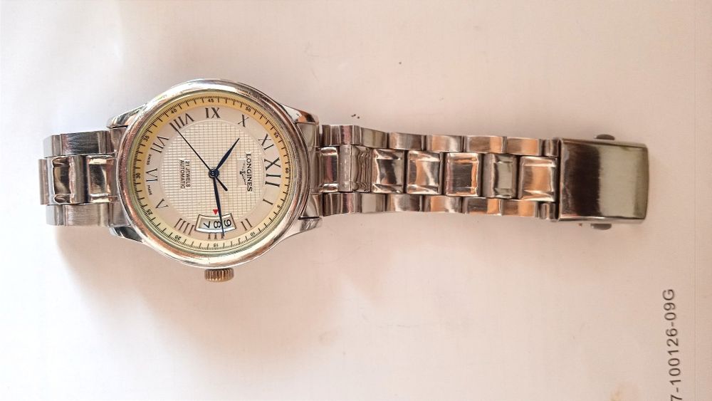 Часы механические Longines.