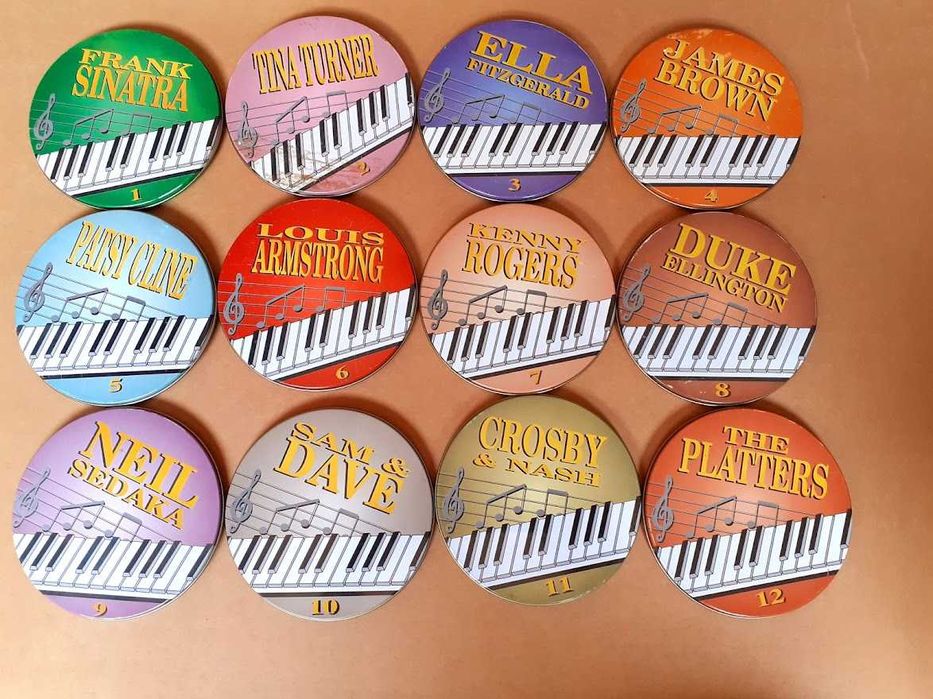 Coleção de Cd´s em caixas metal.