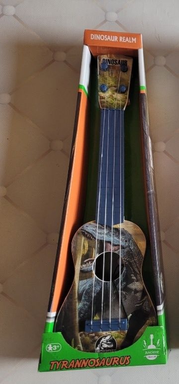 Nowa gitara Dinozaur dla dzieci