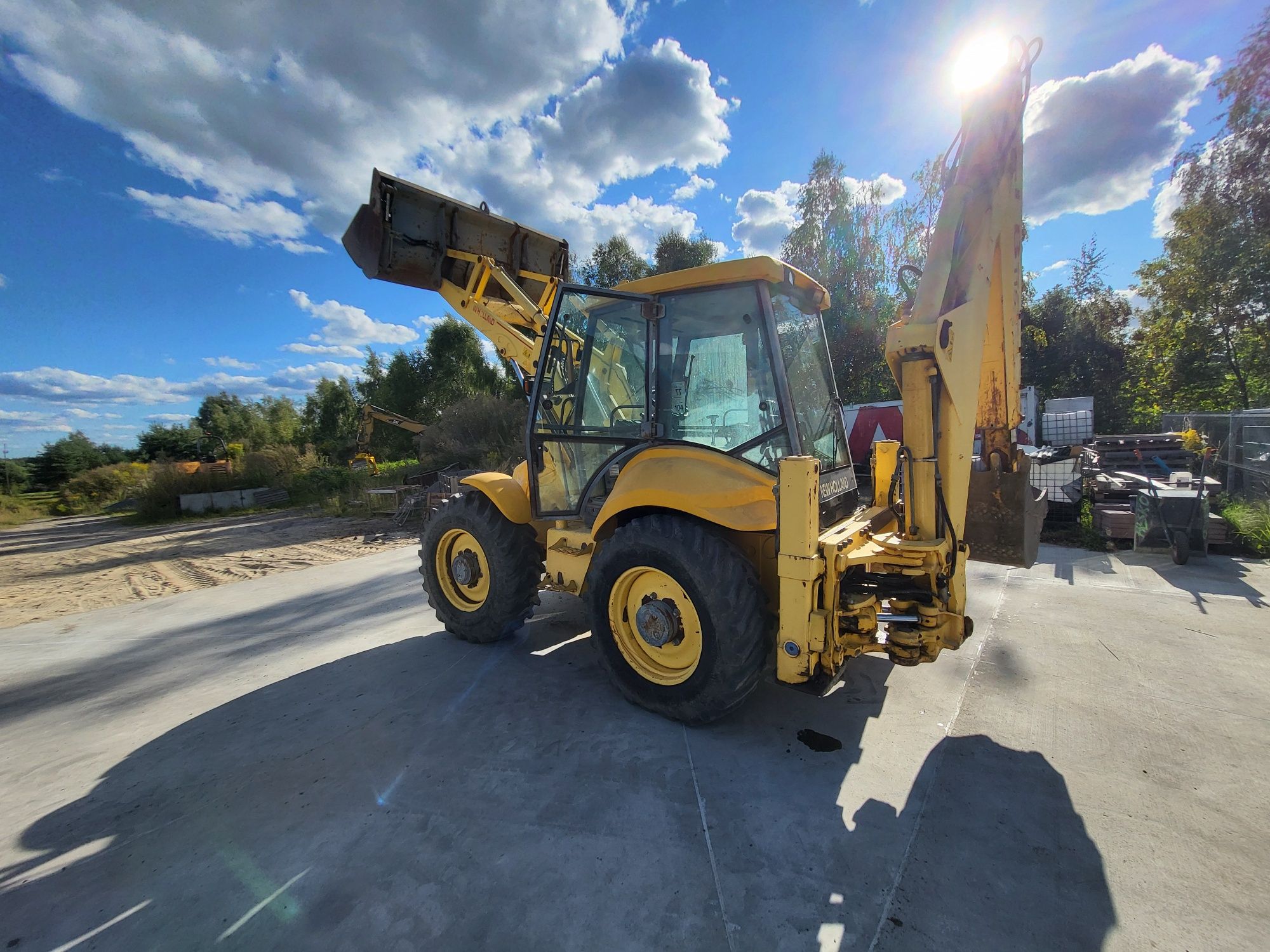 New holland lb 115 klima powershift koparko ładowarka