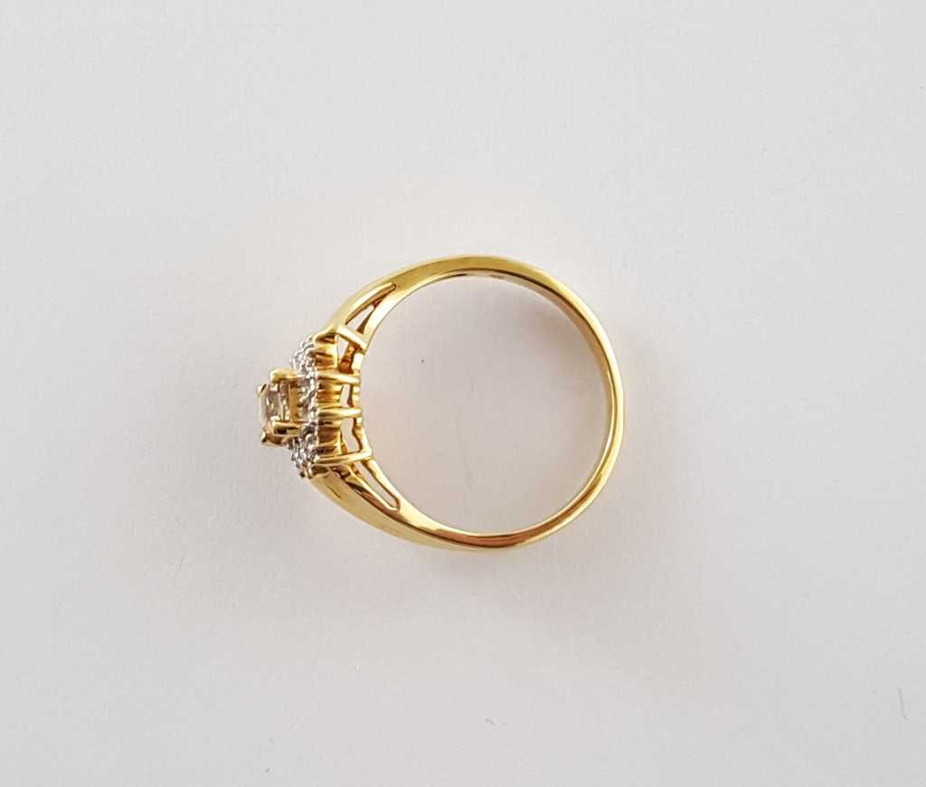 Złoty pierścionek w typie Cartier ze złotym berylem i diamentami