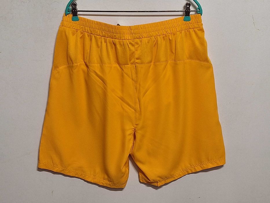 Нові жовті шорти Fila