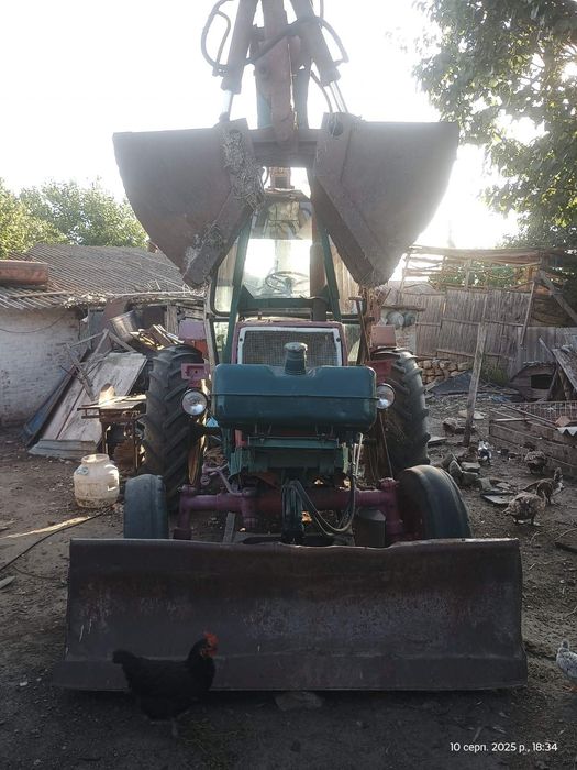 ЮМЗ з грейферною установкою!