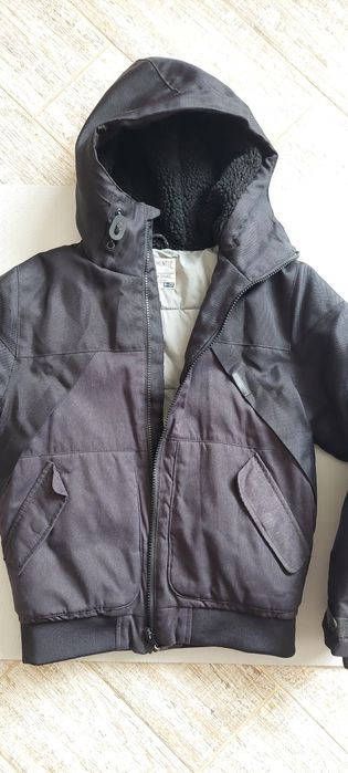 Тепла куртка next