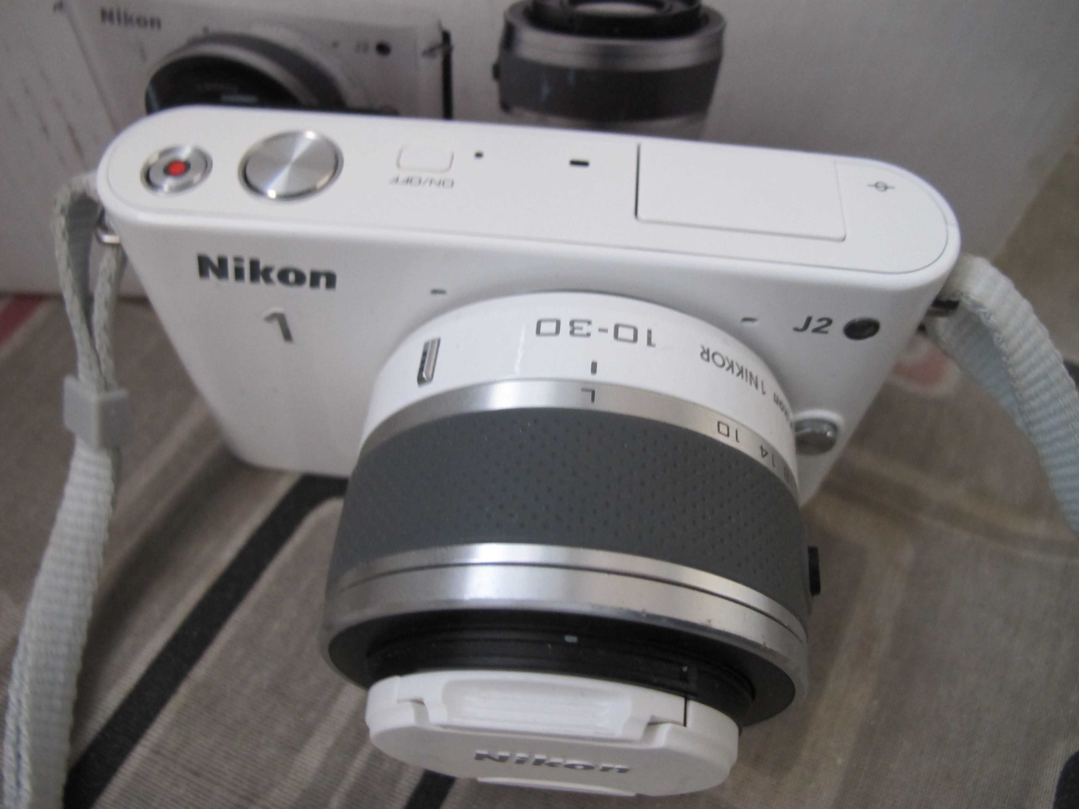Nikon 1J2  у стані нового