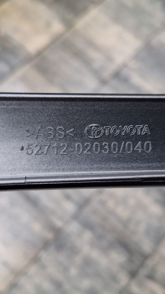 Toyota Corolla E21 kombi HB lewa listwa zderzaka