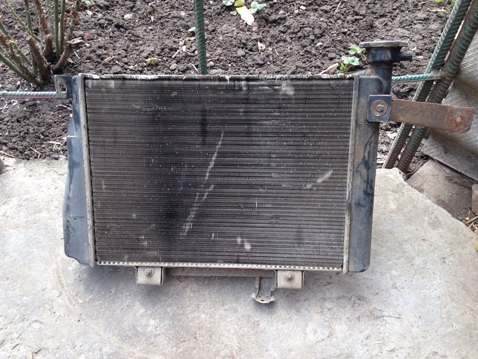 Продам радіатор + вентелятор охолодження Nissan cherry