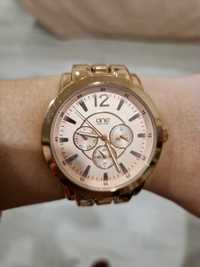 Relógio ONE dourado rosa