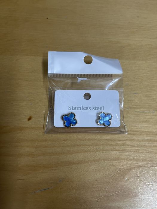 Brincos trevo dourados