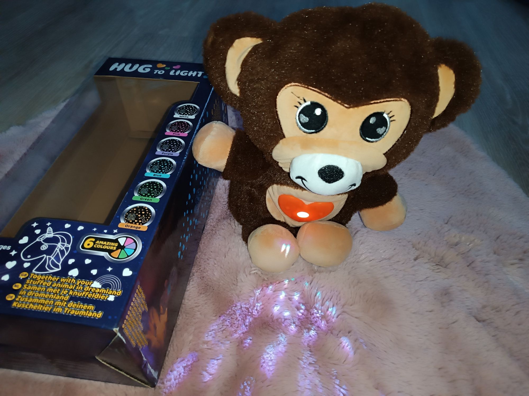 Świecący miś z projektorem pluszowy Hug to light