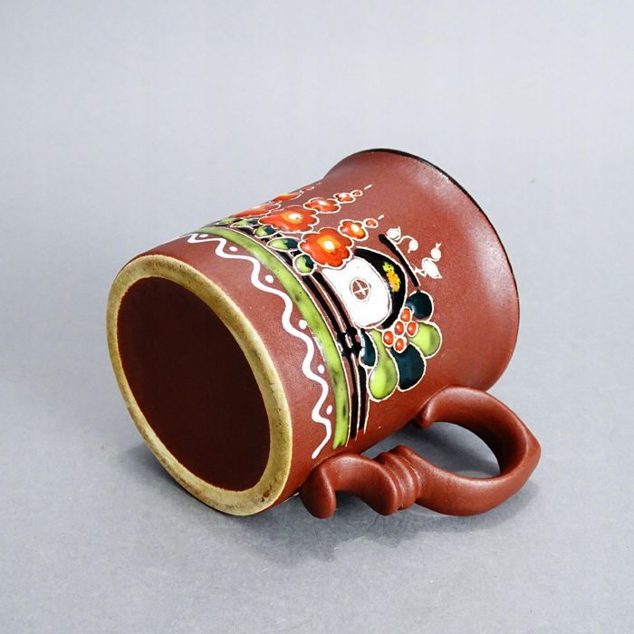 piękny ręcznie zdobiony kubek ceramiczny