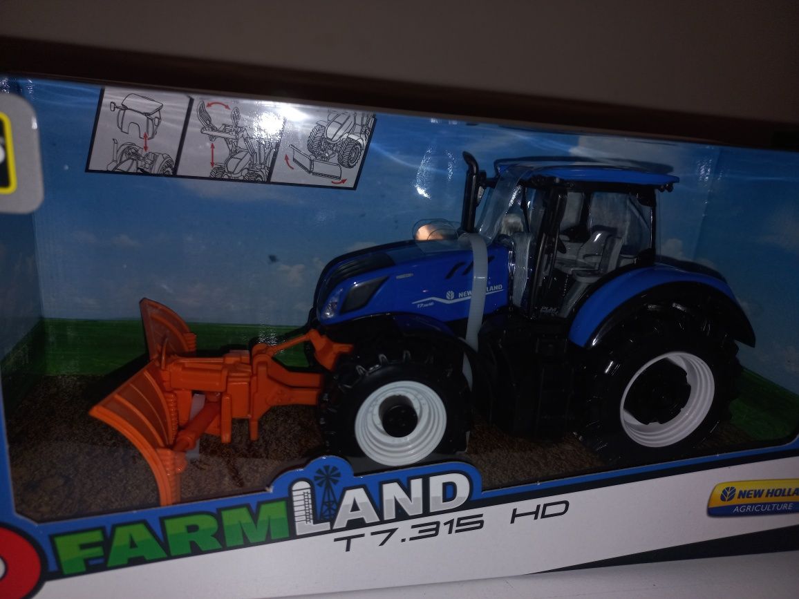 Bburago traktor New Holland,pług śnieżny,skala 1:32