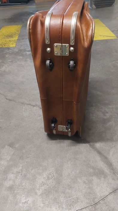 Mala de viagem de cor castanha