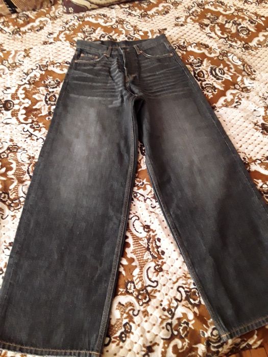 Джинсы новые размер 27/34